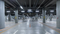 Underground parking garage bathed in light from LED fixtures